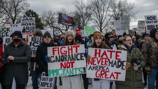 Demonstrators during a protest in Minneapolis, Minnesota, US, on Saturday, Jan. 10, 2026. Thousands marched Saturday in Minneapolis to the site where a federal agent shot and killed Ren�e Nicole Good during a confrontation, heightening political divisions around the Trump administration's immigrant crackdown. Photographer: Victor J. Blue/Bloomberg(Bloomberg)