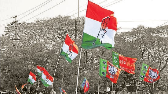 Indore, India - Feb. 4, 2015:(With Indore politics 2016) Main pic. Congress and BJP supporters wave flags in a show of strength in Indore India, on Wednesday, February 4, 2015. (File Photo by Arun Mondhe/ Hindustan Times) (Hindustan Times)