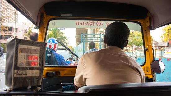 Mumbai, Maharashtra, india - JUNE 4th, 2019 : Inside view of auto-rickshaw driver drives on road transport services starts after ease the lockdown restrictions due to covid-19 (Shutterstock)