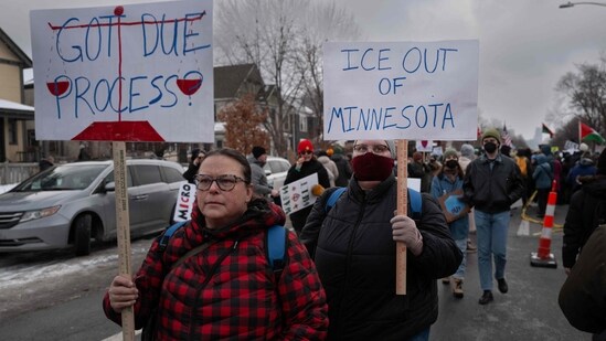 MINNEAPOLIS, MINNESOTA - JANUARY 10: Demonstrators march from Powderhorn Park past the site where Renee Good was killed on January 10, 2026 in Minneapolis, Minnesota. Good was fatally shot by an immigration enforcement agent during an incident in south Minneapolis on January 7. Scott Olson/Getty Images/AFP (Photo by SCOTT OLSON / GETTY IMAGES NORTH AMERICA / Getty Images via AFP)(Getty Images via AFP)