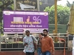 BMC elections 2026 highlights: People pass through the banner instated by BMC to increase citizen participation in the municipal elections and to strengthen democracy.
