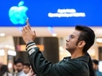 A customer checks an iPhone in Noida. The AI deal announced on Monday marks a major vote of confidence for Google. Its technology already drives much of Samsung's 'Galaxy AI', but the Siri deal unlocks a large market with Apple's installed base of more than 2 billion active devices.