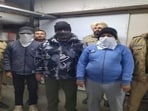 The three accused in police custody on Monday. (HT Photo)