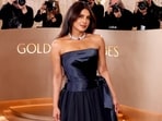 Priyanka Chopra made a highly anticipated return to the 83rd Golden Globe Awards (2026), where she stunned in a Dior gown. Her midnight-blue Dior creation featured a strapless, structured satin bodice that gathered at the torso, leading into a unique tiered, bubble-hem skirt.
