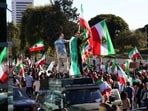 People take part in a "Free Iran" rally in Los Angeles, California, on January 11, 2026. The protests, initially sparked by anger over the rising cost of living, have evolved into a movement against the theocratic system in place in Iran since the 1979 revolution. People take part in a "Free Iran" rally in Los Angeles, California, on January 11, 2026. The protests, initially sparked by anger over the rising cost of living, have evolved into a movement against the theocratic system in place in Iran since the 1979 revolution.