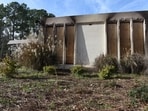 Boards cover the charred remains of the Beth Israel Congregation library, which was set on fire early Saturday morning, on Monday, Jan. 12, 2026, in Jackson, Mississippi.