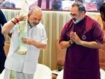 Union Home Minister Amit Shah with Kerala Bharatiya Janata Party (BJP) President Rajeev Chandrasekhar during a meeting with the newly elected party representatives of local bodies, in Thiruvananthapuram, on Sunday. (PTI)