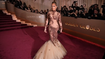 Jennifer Lopez made a show-stopping entrance at the 83rd Golden Globe Awards (January 11, 2026), proving that she is still the undisputed queen of the naked dress. Her sheer, nude-toned naked dress featuring intricate brown and gold brocade details.was from Jean-Louis Scherrer. (AP) Jennifer Lopez made a show-stopping entrance at the 83rd Golden Globe Awards (January 11, 2026), proving that she is still the undisputed queen of the naked dress. Her sheer, nude-toned naked dress featuring intricate brown and gold brocade details.was from Jean-Louis Scherrer. (AP)