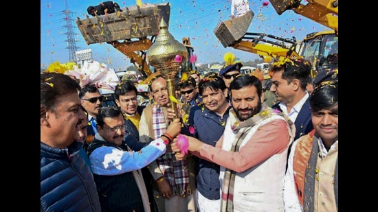 Haryana Chief Minister Nayab Singh Saini, front second right, welcomes BJP national executive president Nitin Nabin, second left, upon his arrival, in Gurugram, Haryana. (PTI)