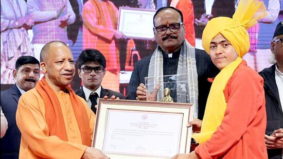 Uttar Pradesh chief minister Yogi Adityanath at a National Youth Day event in Lucknow on Monday. (HT Photo)