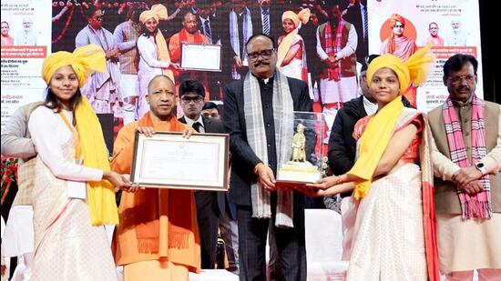 Uttar Pradesh chief minister and deputy CM Brajesh Pathak at the National Youth Day event in Lucknow on Monday. (HT)