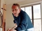 Dilbert waits for his turn while creator Scott Adams takes aim at the 14 ball at his home in Blackhawk, California.