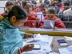 People wait at a centre during hearings under the Special Intensive Revision of electoral rolls in Nadia, West Bengal on January 5. (PTI)