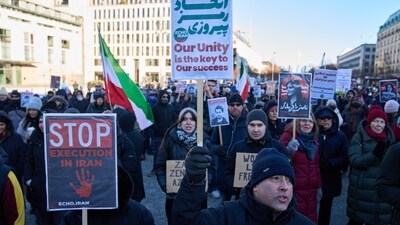 Protesters participate in a demonstration in front of the Brandenburg Gate in Berlin, Germany, in support of the nationwide mass protests in Iran against the government, Sunday, Jan. 11, 2026. (AP) Protesters participate in a demonstration in front of the Brandenburg Gate in Berlin, Germany, in support of the nationwide mass protests in Iran against the government, Sunday, Jan. 11, 2026. (AP)