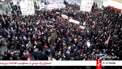 Mourners carry coffins during a funeral procession for members of security forces and civilians said to be killed in protests on Sunday, amid evolving anti-government unrest, in Tehran, Iran, in this screengrab from a video released on January 11, 2026.&nbsp; (via REUTERS)