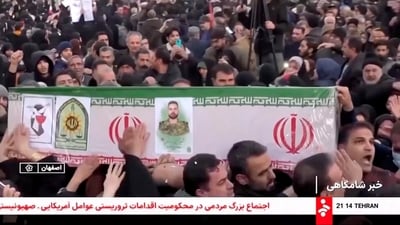 Mourners carry a coffin during a funeral procession for members of security forces and civilians said to be killed in protests on Sunday, amid evolving anti-government unrest, in Tehran, Iran, in this screengrab from a video released on January 11, 2026. (via REUTERS)