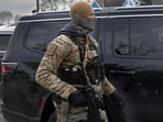 Border Patrol agents secure their perimeter after making an apprehension on January 11, 2026 in Minneapolis, Minnesota.
