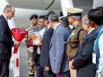 German Chancellor Friedrich Merz receives a warm welcome upon his arrival at Kempegowda International Airport, in Bengaluru on Tuesday. (Arun Kumar Rao)