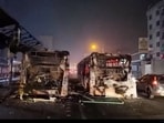 Burnt vehicles lie on the road in Tehran, in this screengrab from Iran's state media broadcast footage. 