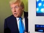 US President Donald Trump speaks with reporters aboard Air Force One at Al Udeid Air Base in Doha, Qatar, Oct. 25, 2025. (AP Photo/Mark Schiefelbein, File)