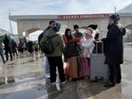 Iranians stand at the Kapikoy Border Gate after crossing into Turkey in Van province on January 14 (REUTERS) Iranians stand at the Kapikoy Border Gate after crossing into Turkey in Van province on January 14 (REUTERS)