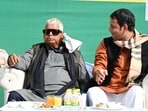 Janshakti Janta Dal party president and former RJD MLA Tej Pratap Yadav with his father and RJD Chief Lalu Prasad during 'Dahi-Chura Bhoj' on the occasion of Makar Sankranti festival at his residence in Patna, Bihar, India, Wednesday,14, 2026.(Photo by / Hindustan Times) (Santosh Kumar/HT) Janshakti Janta Dal party president and former RJD MLA Tej Pratap Yadav with his father and RJD Chief Lalu Prasad during 'Dahi-Chura Bhoj' on the occasion of Makar Sankranti festival at his residence in Patna, Bihar, India, Wednesday,14, 2026.(Photo by / Hindustan Times) (Santosh Kumar/HT)