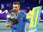 Australia's Jordan Smith celebrates with the trophy after defeating Taiwan's Joanna Garland in the 1 Point Slam exhibition event. Australia's Jordan Smith celebrates with the trophy after defeating Taiwan's Joanna Garland in the 1 Point Slam exhibition event.
