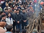 Lohri came as a much-needed respite for Chandigarh residents amid the dropping temperatures. Seen in picture: PU vice-chancellor Renu Vig along with PU student body president Gauravveer Sohal during the celebrations on campus on Monday. (Ravi Kumar/HT)