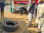 Police say the container’s wheel hit a rock before rupturing; the driver fled but was later arrested and booked for negligence. (HT)