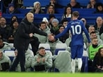 Chelsea's Cole Palmer shakes hands with ex-manager Enzo Maresca after being substituted.