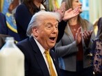 Donald Trump reacts as he participates in a signing ceremony for the Whole Milk for Healthy Kids Act