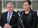 Danish Foreign Minister Lars Rasmussen and Greenland's Foreign Minister Vivian Motzfeldt speak during a news conference at the Danish Embassy in Washington.
