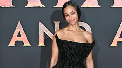 US actress Zoe Saldana poses during a photocall for the European premiere of "Avatar: Fire and Ash" at the Seine Musicale concert hall in Boulogne-Billancourt, on the outskirts of Paris on December 5, 2025. (Photo by Bertrand GUAY / AFP) (AFP)