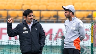 Gautam Gambhir and Jitesh Sharma during a training session ahead of the third T20I. (PTI) Gautam Gambhir and Jitesh Sharma during a training session ahead of the third T20I. (PTI)