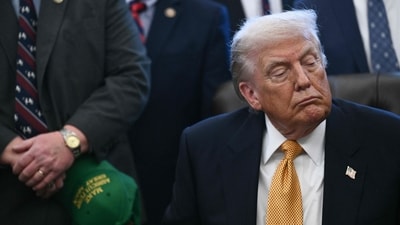 US President Donald Trump looks on before signing a bill in the Oval Office of the White House in Washington, DC, on January 14, 2026. (AFP) US President Donald Trump looks on before signing a bill in the Oval Office of the White House in Washington, DC, on January 14, 2026. (AFP)