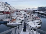 Fishermen arrive at the harbour of Nuuk, Greenland, Wednesday, Jan. 14, 2026. (AP Photo/Evgeniy Maloletka)