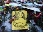 A video of a federal officer knocking over Renee Good's memorial candles drew criticism, but it was confirmed that the officer was not an ICE agent and the incident occurred in Sacramento. (AP Photo/Adam Gray)