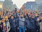 Labourers during a protest outside a factory in Kanganwal, Ludhiana, on Thursday. (HT Photo)
