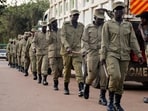 Ugandan police patrol the streets ahead of the general elections in Kampala, Uganda.