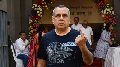Actor Paresh Rawal shows his ink marked finger after casting vote. (PTI) Actor Paresh Rawal shows his ink marked finger after casting vote. (PTI)