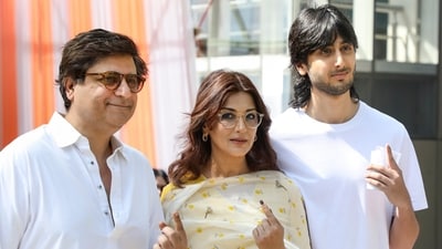 Mumbai: Bollywood actor Sonali Bendre with her husband Goldie Behl and son Ranveer Behl after casting their votes at a polling station. (PTI) Mumbai: Bollywood actor Sonali Bendre with her husband Goldie Behl and son Ranveer Behl after casting their votes at a polling station. (PTI)