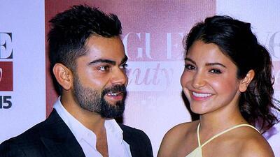 Virat Kohli and Anushka Sharma made quite a pair at a recent fashion event in Mumbai. Not hiding from camera any more, the power couple was happy to pose for shutterbugs. (PTI photo) Virat Kohli and Anushka Sharma made quite a pair at a recent fashion event in Mumbai. Not hiding from camera any more, the power couple was happy to pose for shutterbugs. (PTI photo)