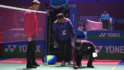New Delhi, India - Jan. 15, 2026: Officials seen cleaning the Bird droppings as Prannoy H. S. from India competes during the Mens Single match against Loh Kean Yew from Singapore during the third day of YONEX-SUNRISE India Open 2026 at Indira Gandhi Sports Complex in New Delhi, India, on Thursday, January 15, 2026. (Photo by Sanchit Khanna/ Hindustan Times) (Hindustan Times) New Delhi, India - Jan. 15, 2026: Officials seen cleaning the Bird droppings as Prannoy H. S. from India competes during the Mens Single match against Loh Kean Yew from Singapore during the third day of YONEX-SUNRISE India Open 2026 at Indira Gandhi Sports Complex in New Delhi, India, on Thursday, January 15, 2026. (Photo by Sanchit Khanna/ Hindustan Times) (Hindustan Times)