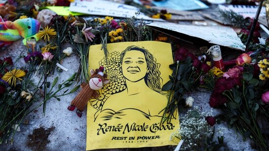A video of a federal officer knocking over Renee Good's memorial candles drew criticism, but it was confirmed that the officer was not an ICE agent and the incident occurred in Sacramento. (AP Photo/Adam Gray) (AP)
