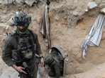 Israeli soldiers at the entrance to a tunnel, in Rafah in the southern Gaza Strip,