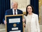 Venezuelan opposition leader Maria Corina Machado presents her Nobel Peace Prize to US President Donald Trump during a meeting at the Oval Office, in Washington, DC. Venezuelan opposition leader Maria Corina Machado presents her Nobel Peace Prize to US President Donald Trump during a meeting at the Oval Office, in Washington, DC.