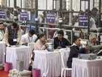 Polling officials during the counting of votes in Nagpur on Friday. (PTI)