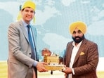 Punjab chief minister Bhagwant Mann presenting a souvenir to British Columbia premier David Eby. (HT) Punjab chief minister Bhagwant Mann presenting a souvenir to British Columbia premier David Eby. (HT)