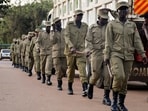 His main opponent, singer-turned-politician Bobi Wine earlier said he had been under house arrest after police surrounded his compound.