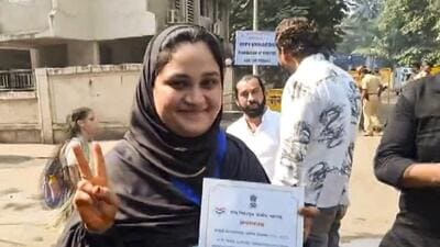 **EDS: SCREENSHOT VIA PTI VIDEOS** Mumbai: AIMIM's Khairunnisa Akbar Hussain shows her certificate after her victory in the Brihanmumbai Municipal Corporation elections, in Mumbai, Friday, Jan. 16, 2026. (PTI Photo)(PTI01_16_2026_000095B) (PTI) **EDS: SCREENSHOT VIA PTI VIDEOS** Mumbai: AIMIM's Khairunnisa Akbar Hussain shows her certificate after her victory in the Brihanmumbai Municipal Corporation elections, in Mumbai, Friday, Jan. 16, 2026. (PTI Photo)(PTI01_16_2026_000095B) (PTI)
